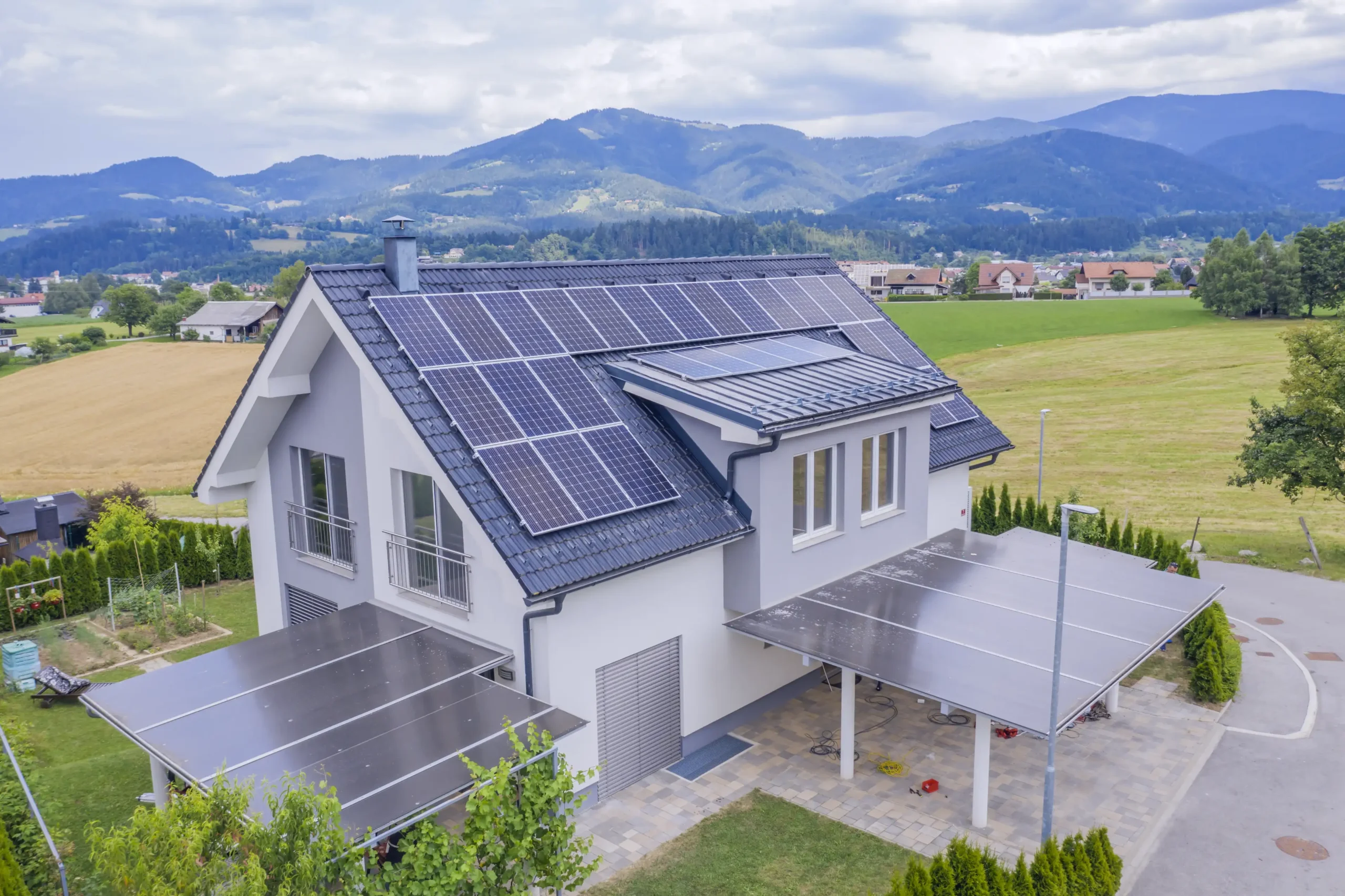 Solar panels installed on a modern home during eco-friendly home remodeling